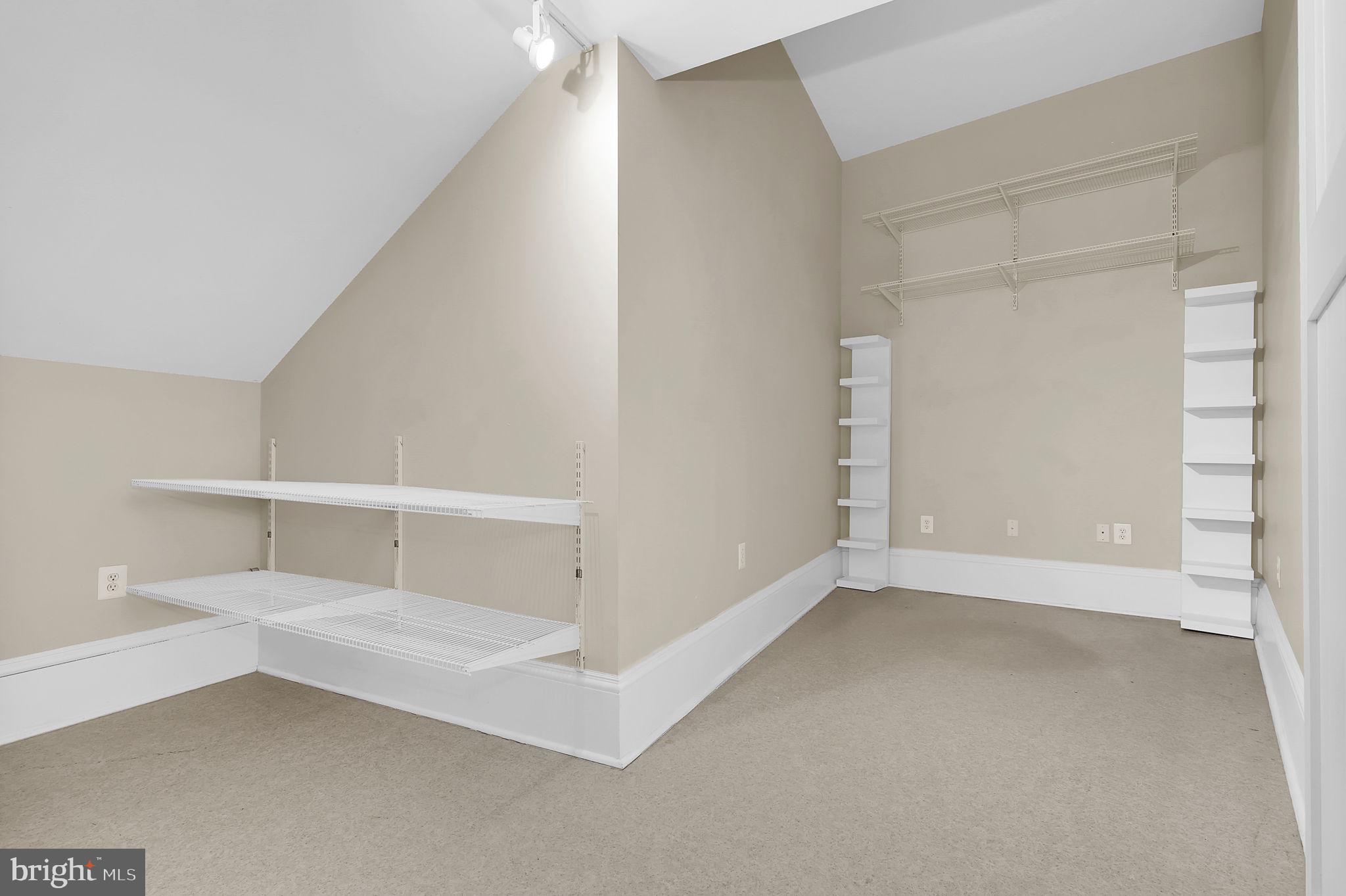 9610 Dewitt Drive, Unit SH205 Silver Spring, MD 20910 - Photo 19 of 59 a view of an empty walk in closet