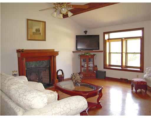 622 Boyers Road Boyers, PA 16020 - Photo 6 of 18 Living Room. Cathedral ceilings in living rm, beautiful oak plank floors, oak woodburning fireplace.