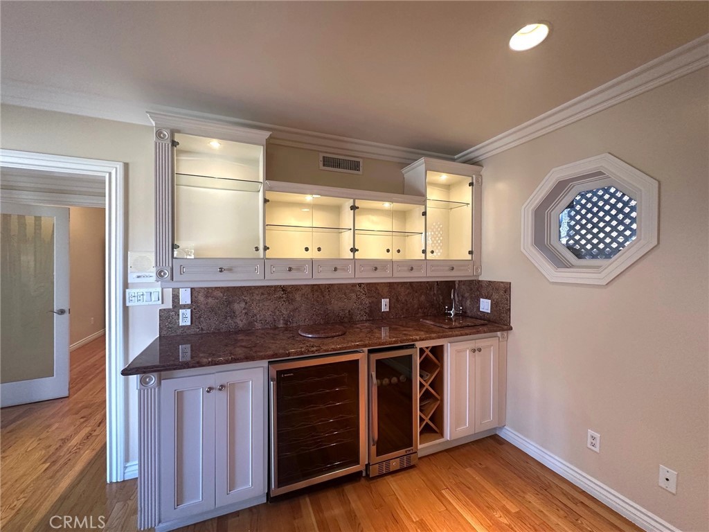 9861 Estrella Avenue Temple City, CA 91780 - Photo 25 of 50 Wet Bar, Wine Fridge and cabinets in Family Room