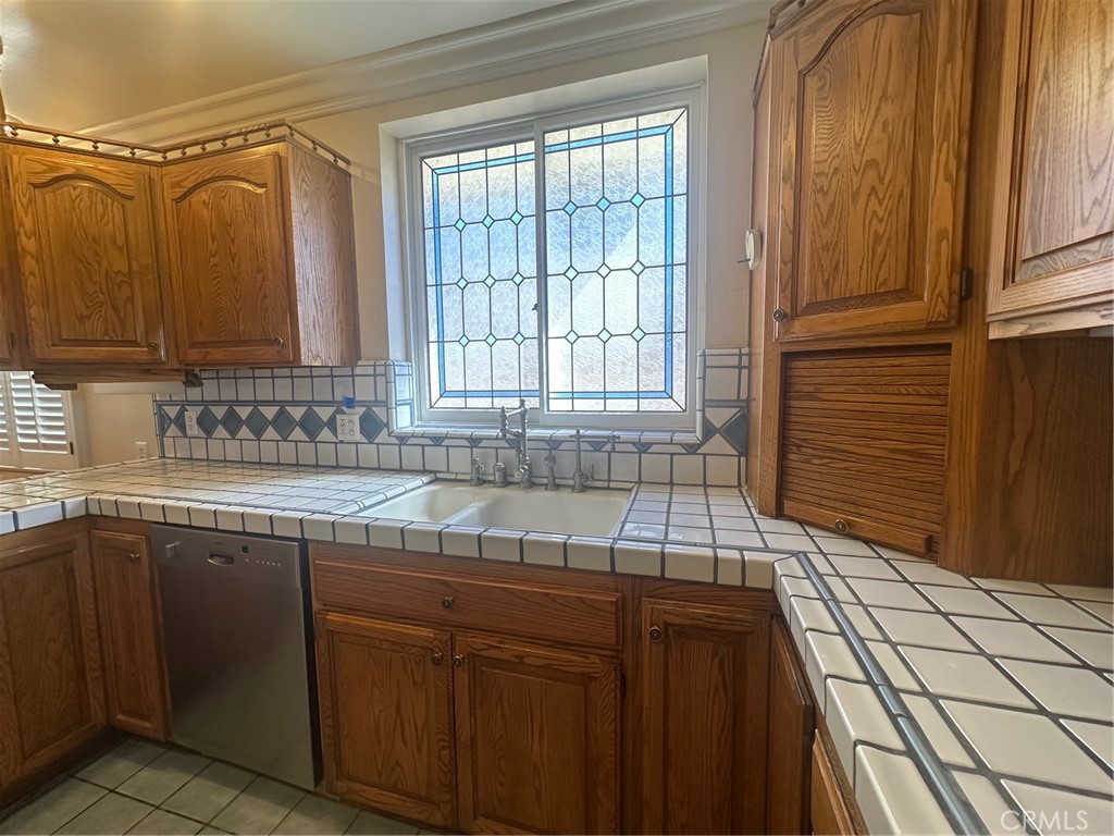 9861 Estrella Avenue Temple City, CA 91780 - Photo 10 of 50 Appliance garage in corner. Custom stained glass window over sink