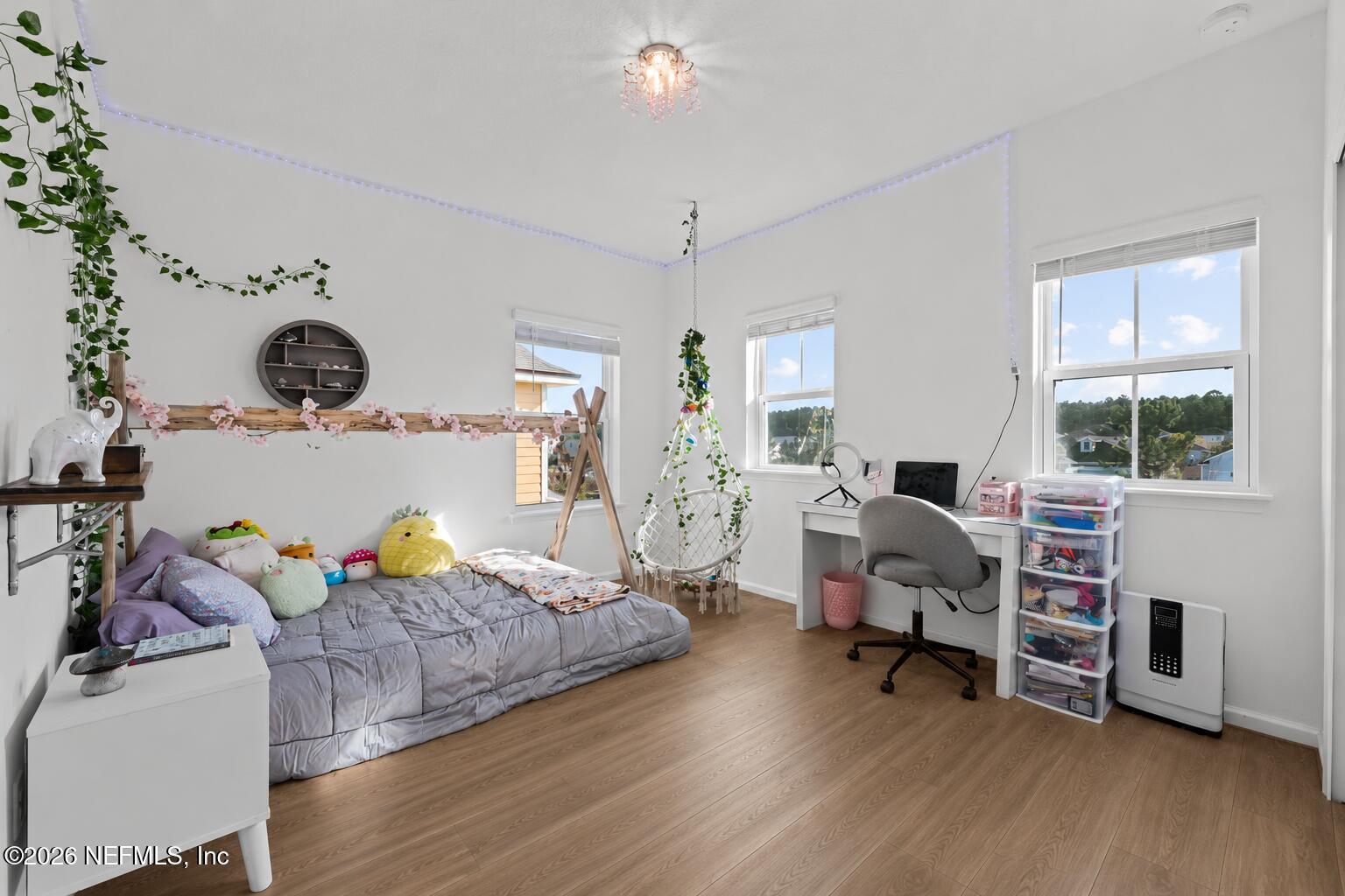 92 Patina Place St. Augustine, FL 32092 - Photo 20 of 26 a bedroom with bed and a window