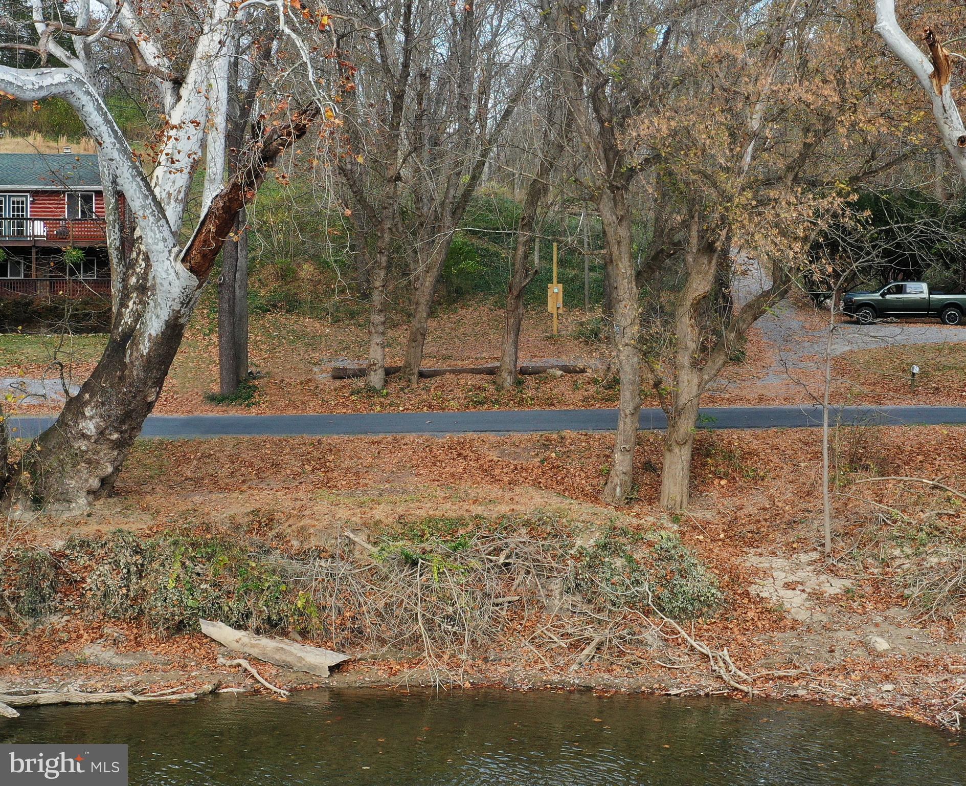 Lot D Lockes Mill Road Berryville, VA 22611 - Photo 3 of 29 a backyard of a house with lots of green space