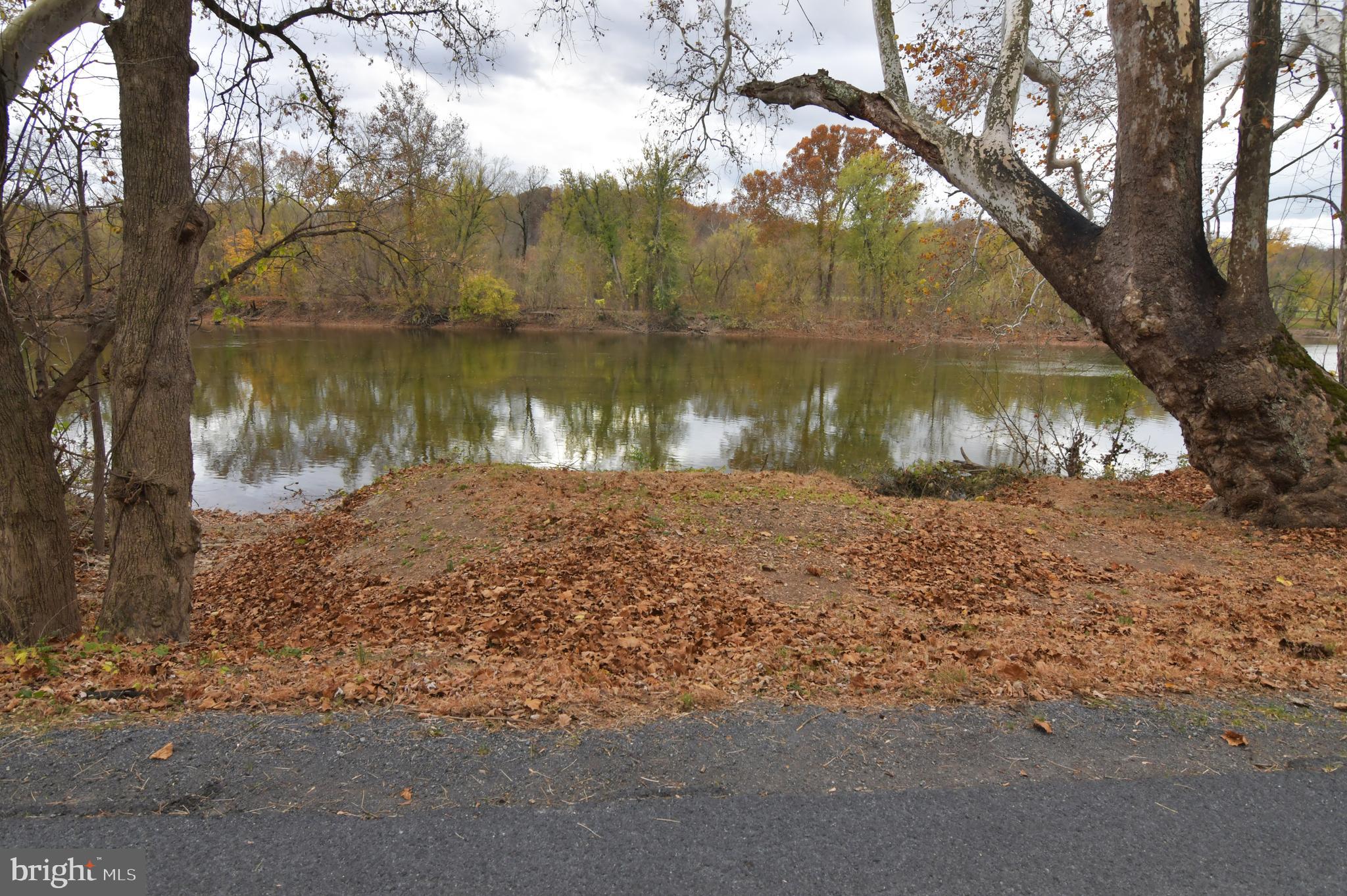 Lot D Lockes Mill Road Berryville, VA 22611 - Photo 4 of 29 a view of a lake with a yard