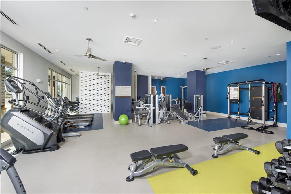6919 Peachtree Dunwoody Road, Unit 131 Sandy Springs, GA 30328 - Photo 39 of 43 a view of a room with gym equipment