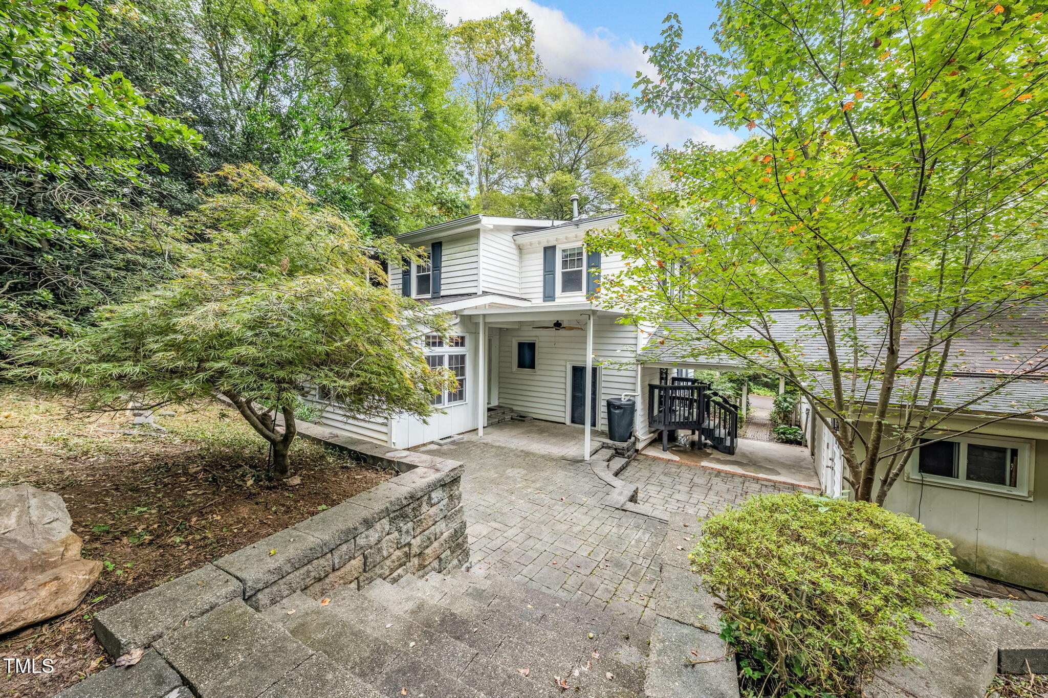6221 Rushingbrook Drive Raleigh, NC 27612 - Photo 29 of 30 a front view of a house with garden