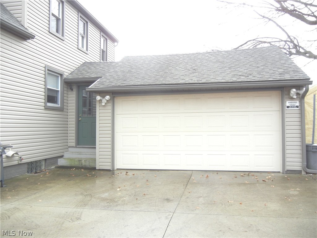 1105 Raff Road Southwest Canton, OH 44710 - Photo 13 of 15 Attached 2 car garage and at end of drive is room for 2 more cars