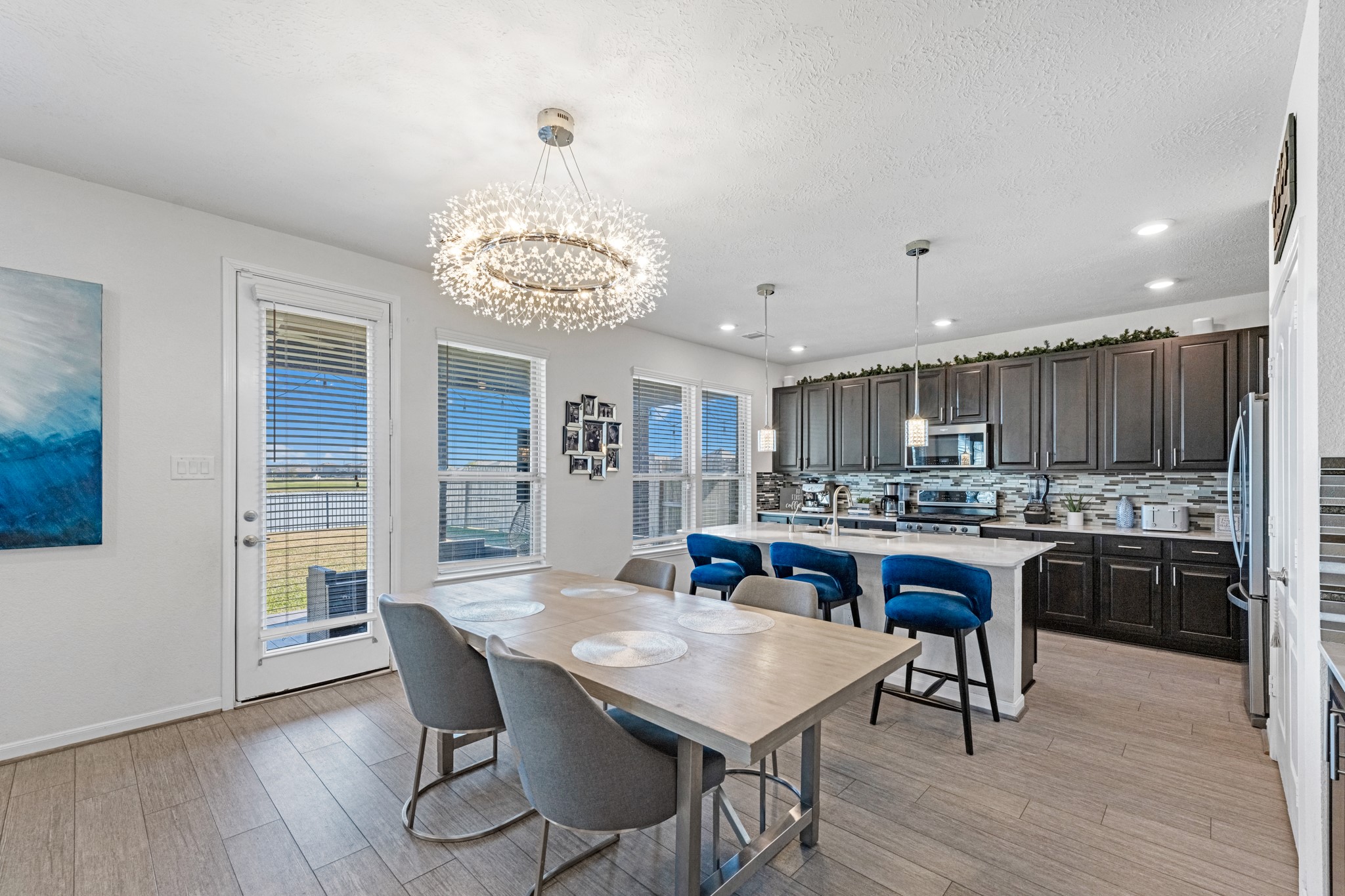 5126 Avondale Rise Street Katy, TX 77493 - Photo 11 of 28 The dining area is a perfect blend of style and functionality, providing an inviting space for memorable meals and gatherings.