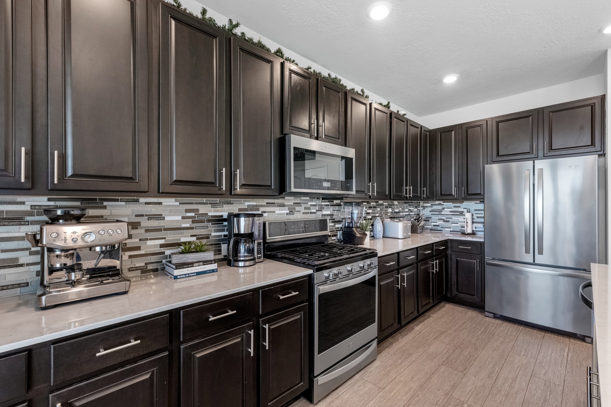 5126 Avondale Rise Street Katy, TX 77493 - Photo 16 of 28 This kitchen is not only a functional space but also has ample storage. Whether you're a seasoned chef or just love to gather and enjoy good food, this kitchen is a dream come true.