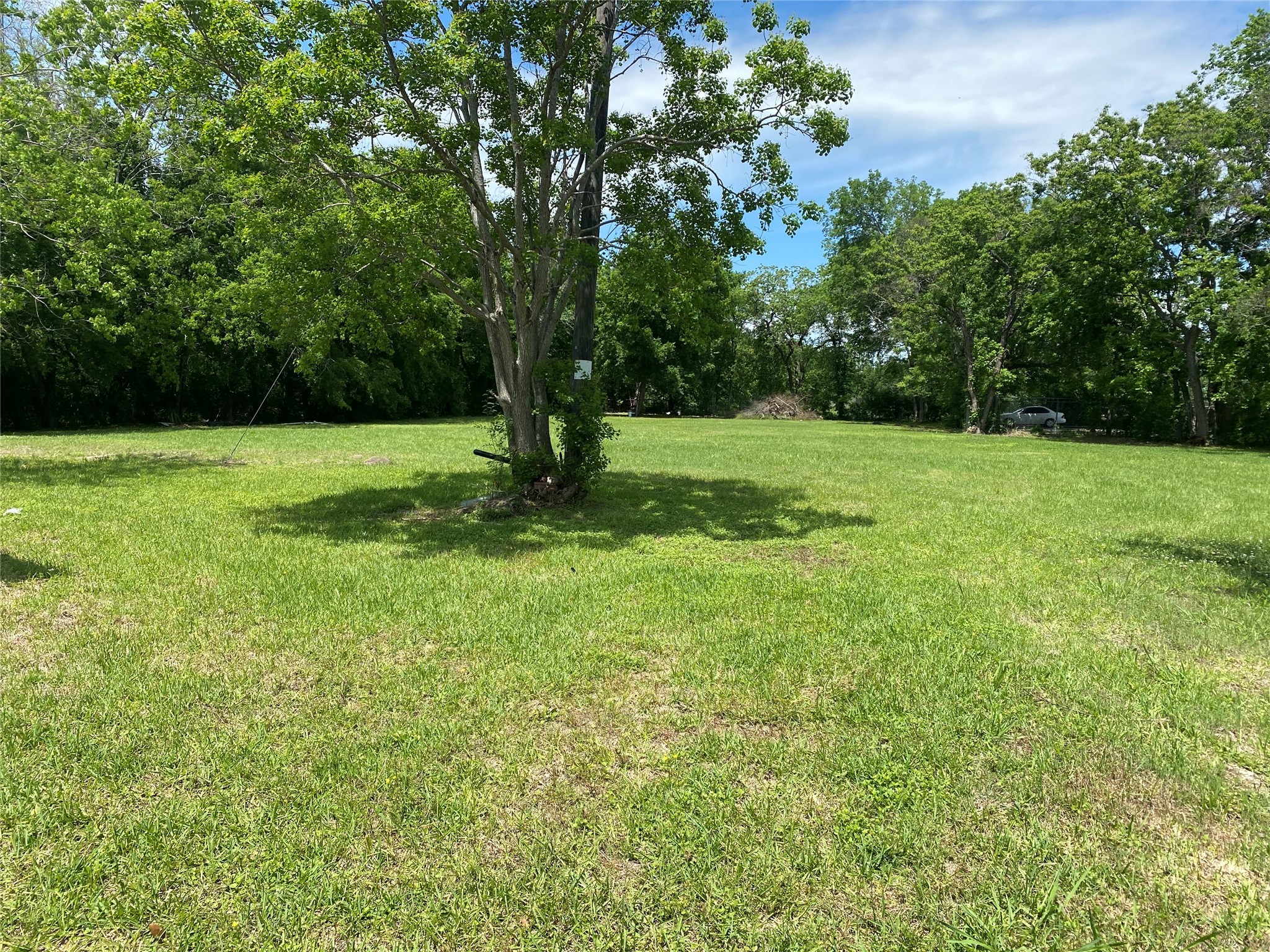 926 West Cedar Bayou Lynchburg Road Baytown, TX 77521 - Photo 6 of 10 a view of field with trees in the background