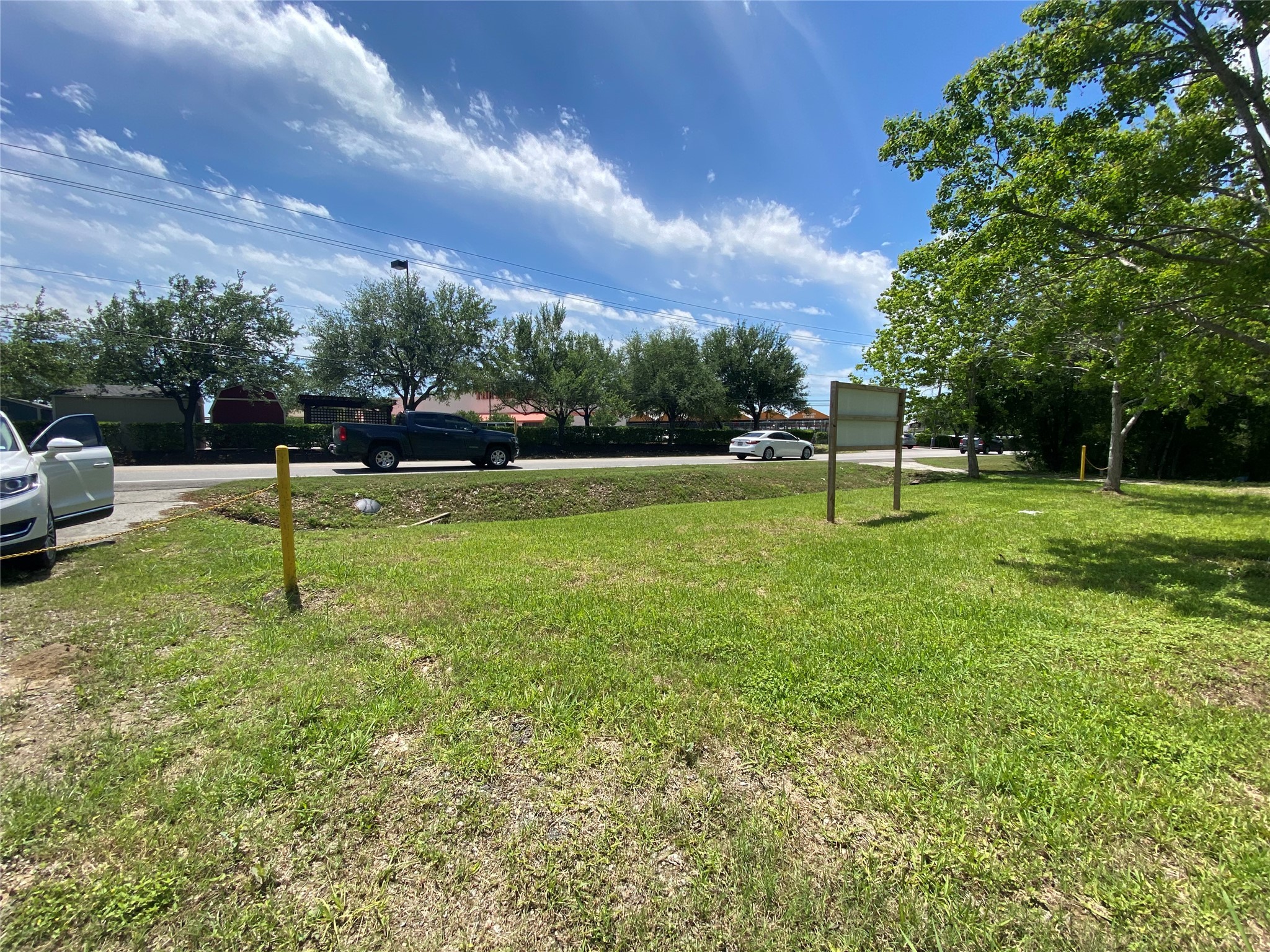 926 West Cedar Bayou Lynchburg Road Baytown, TX 77521 - Photo 9 of 10 a view of a park with slide and a lake