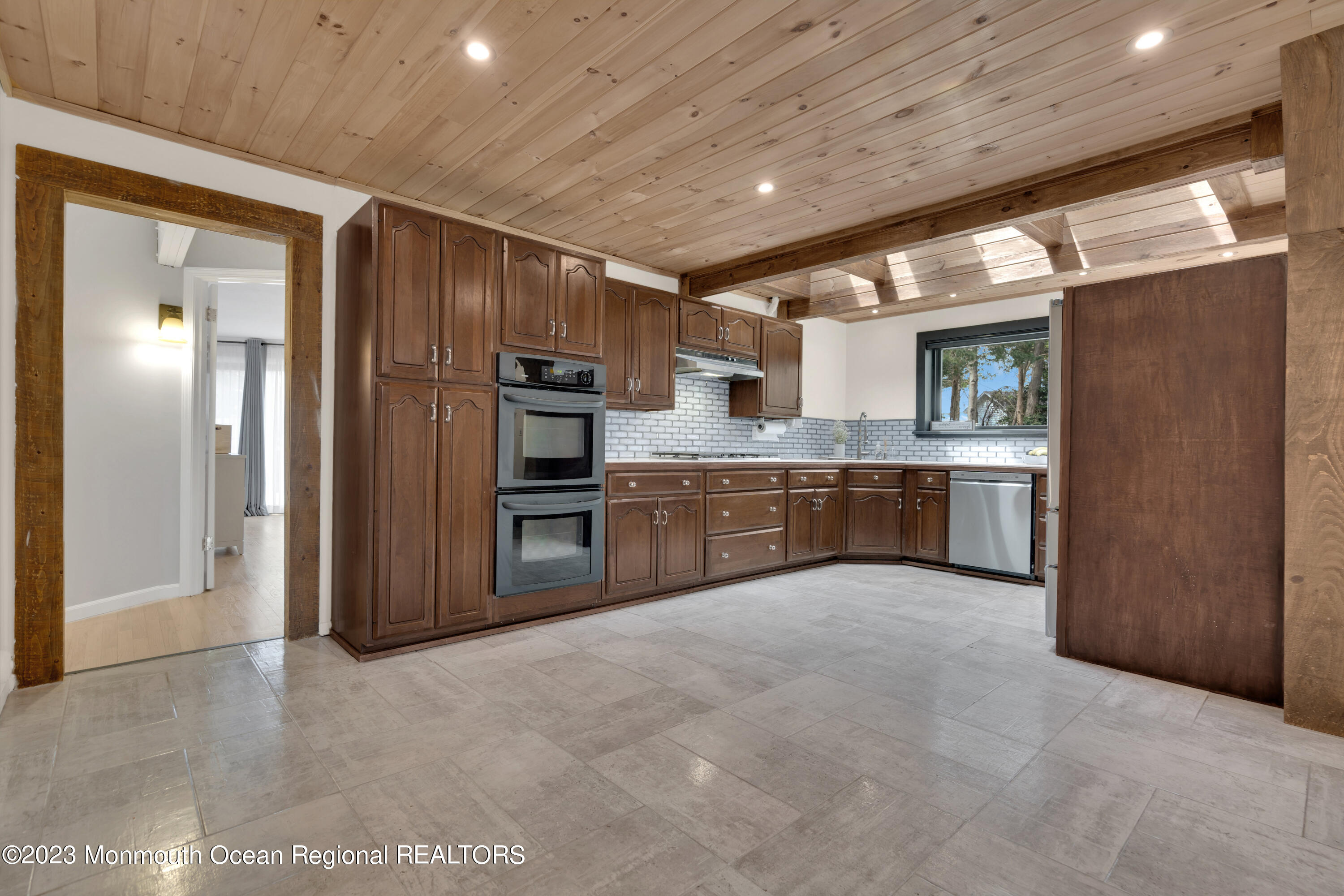 649 Hyson Road Jackson, NJ 08527 - Photo 13 of 67 a large kitchen with stainless steel appliances granite countertop a stove refrigerator and cabinets