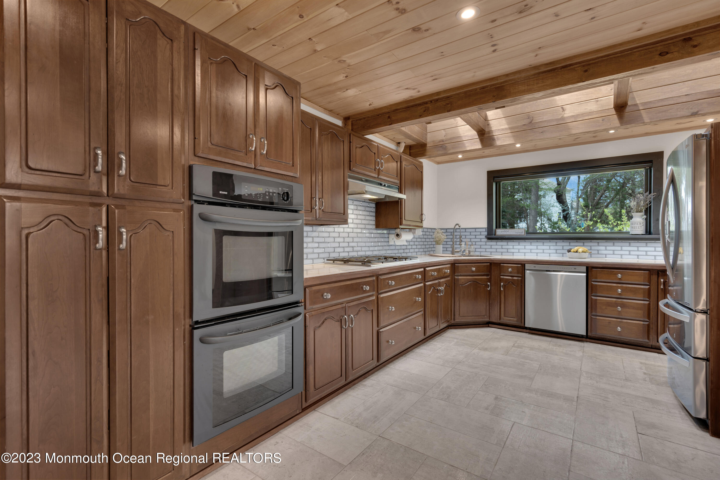 649 Hyson Road Jackson, NJ 08527 - Photo 14 of 67 a kitchen with stainless steel appliances granite countertop a refrigerator a stove and a sink