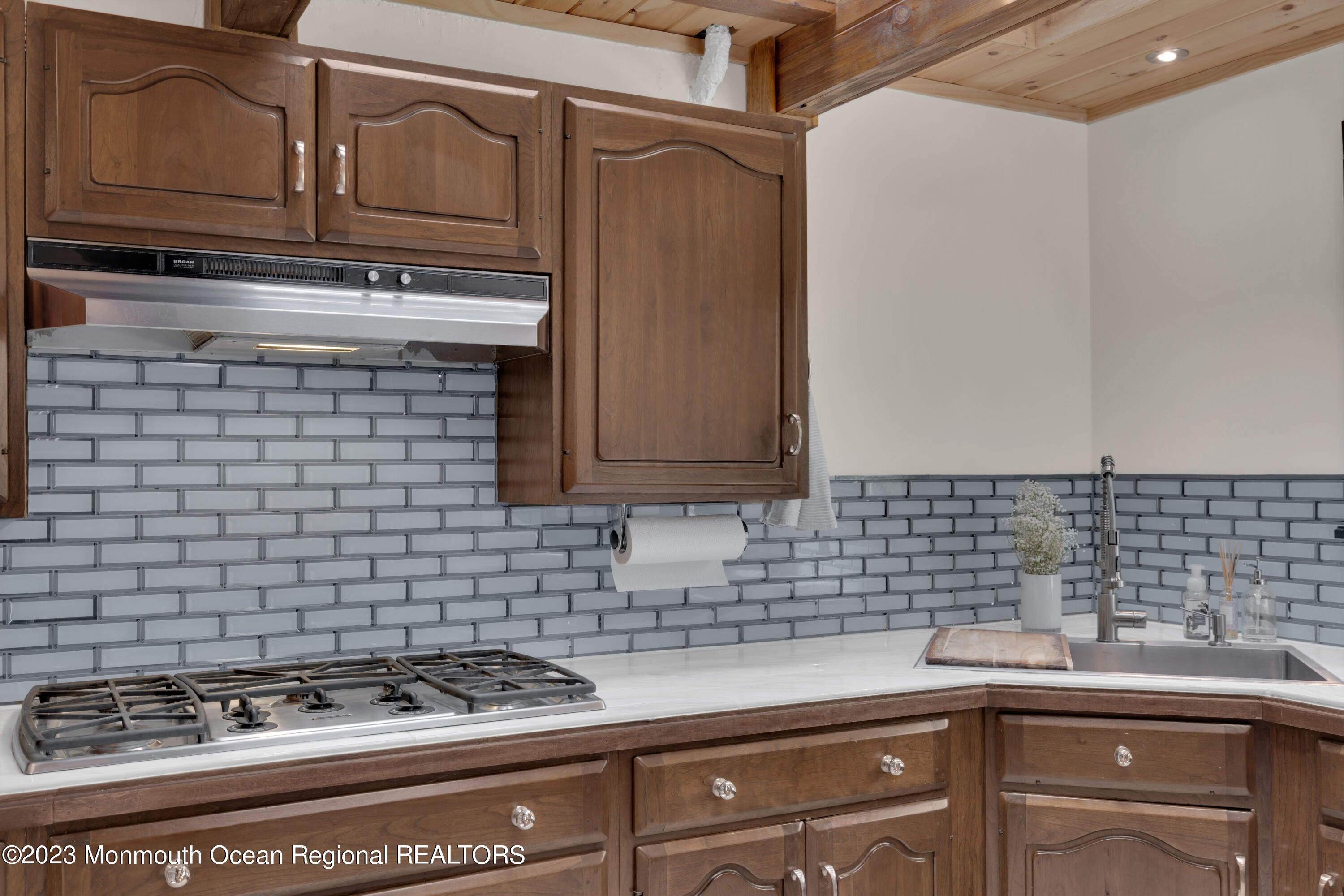 649 Hyson Road Jackson, NJ 08527 - Photo 15 of 67 a kitchen with a stove and cabinets