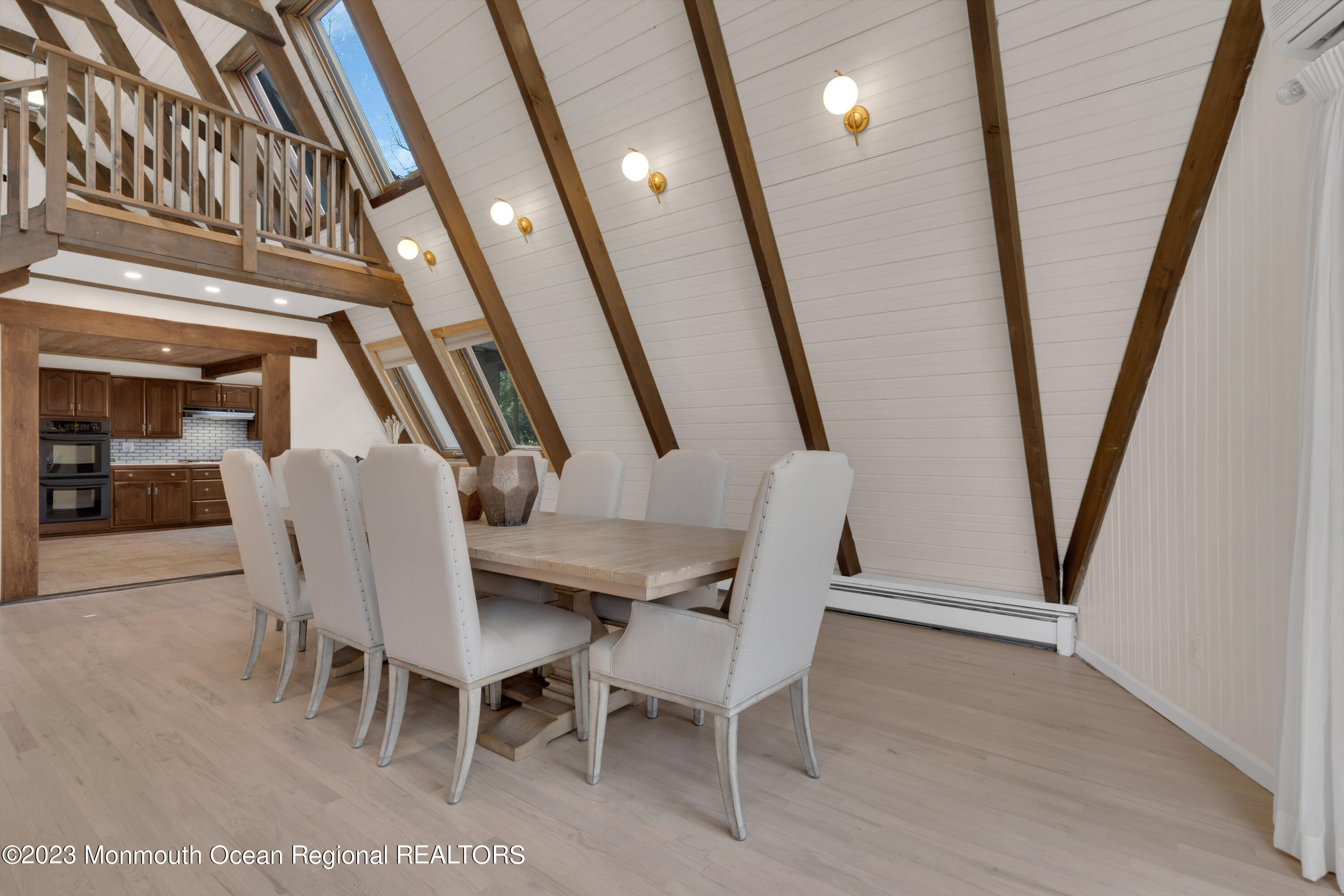 649 Hyson Road Jackson, NJ 08527 - Photo 20 of 67 a dining room with furniture and wooden floor