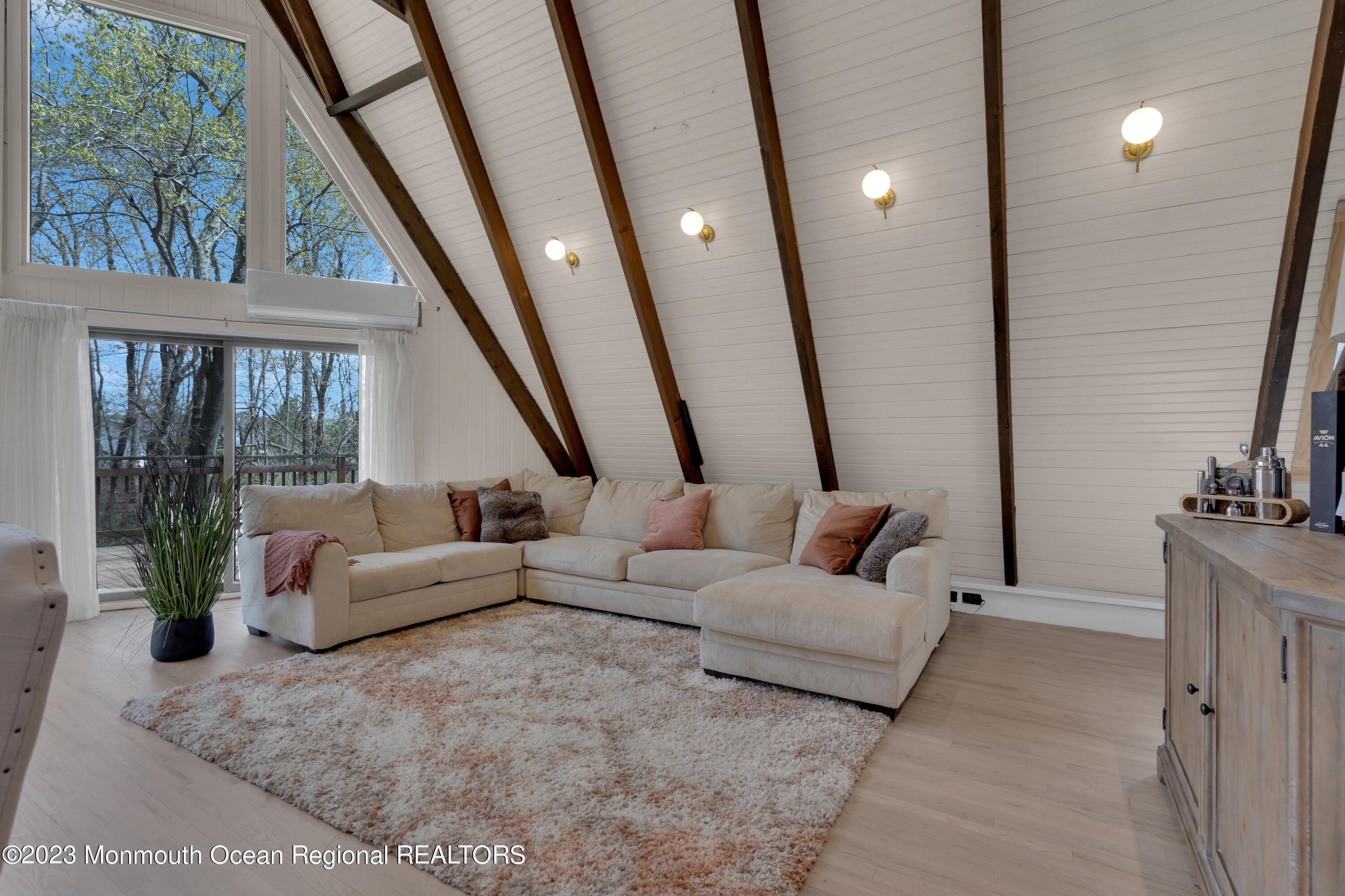 649 Hyson Road Jackson, NJ 08527 - Photo 26 of 67 a living room with furniture and a large window