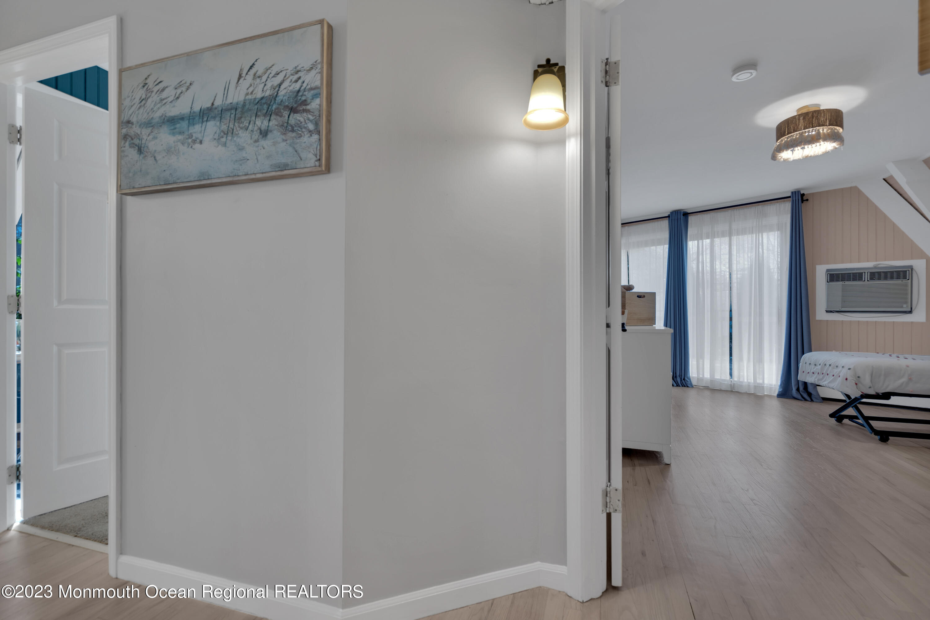 649 Hyson Road Jackson, NJ 08527 - Photo 33 of 67 a view of a hallway to a livingroom with furniture
