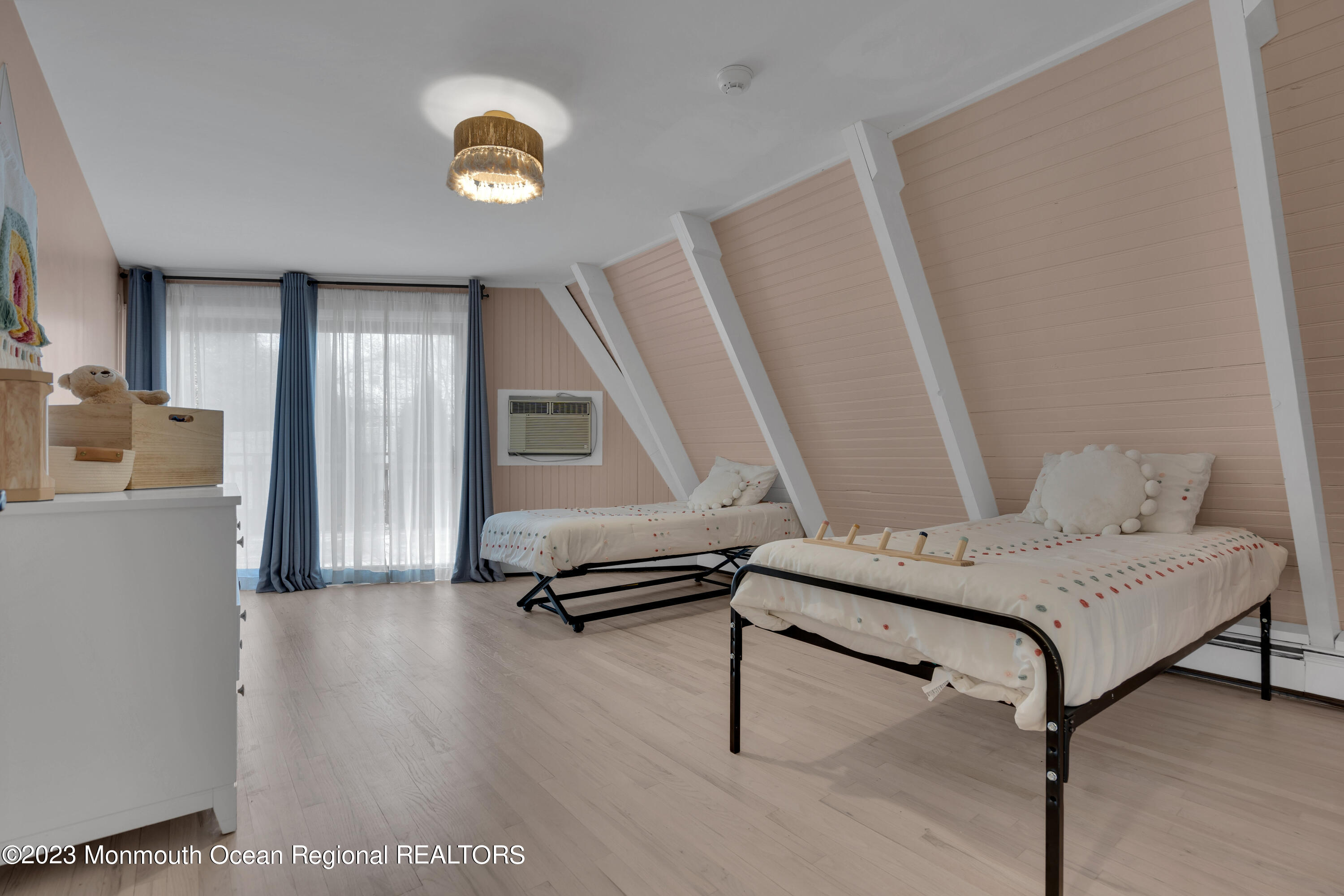 649 Hyson Road Jackson, NJ 08527 - Photo 34 of 67 a living room with furniture and a window