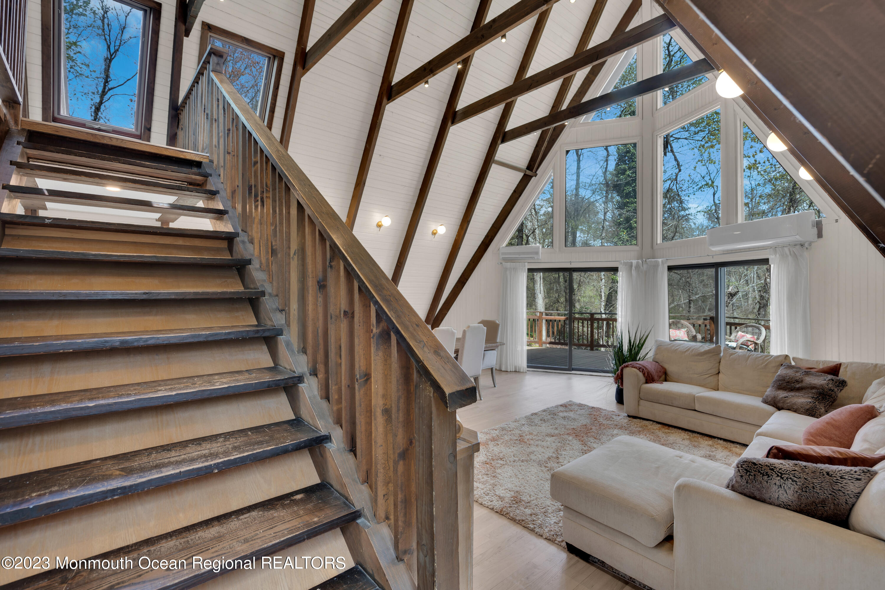 649 Hyson Road Jackson, NJ 08527 - Photo 39 of 67 a living room with furniture and a large window