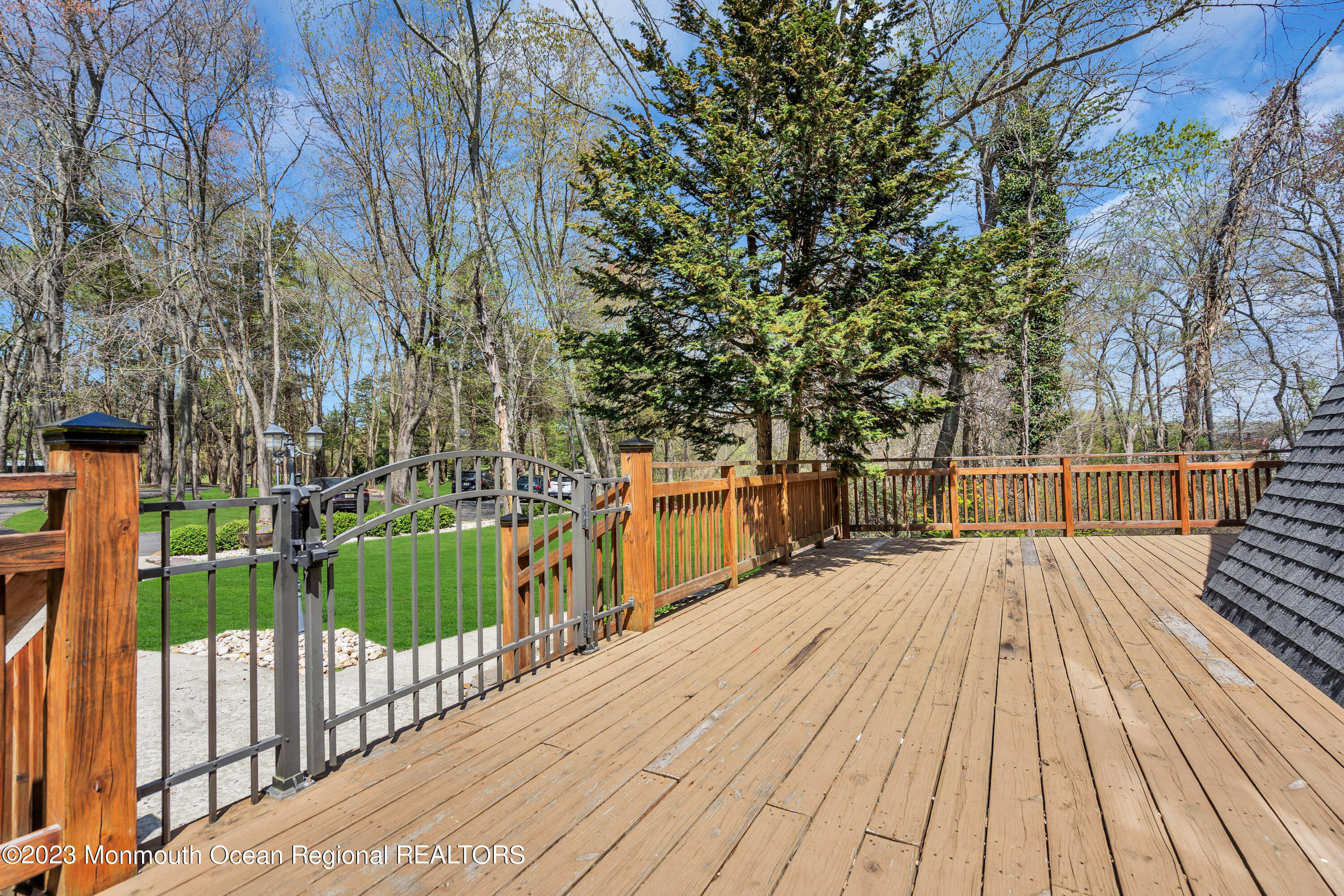649 Hyson Road Jackson, NJ 08527 - Photo 53 of 67 a view of balcony with wooden floor and fence