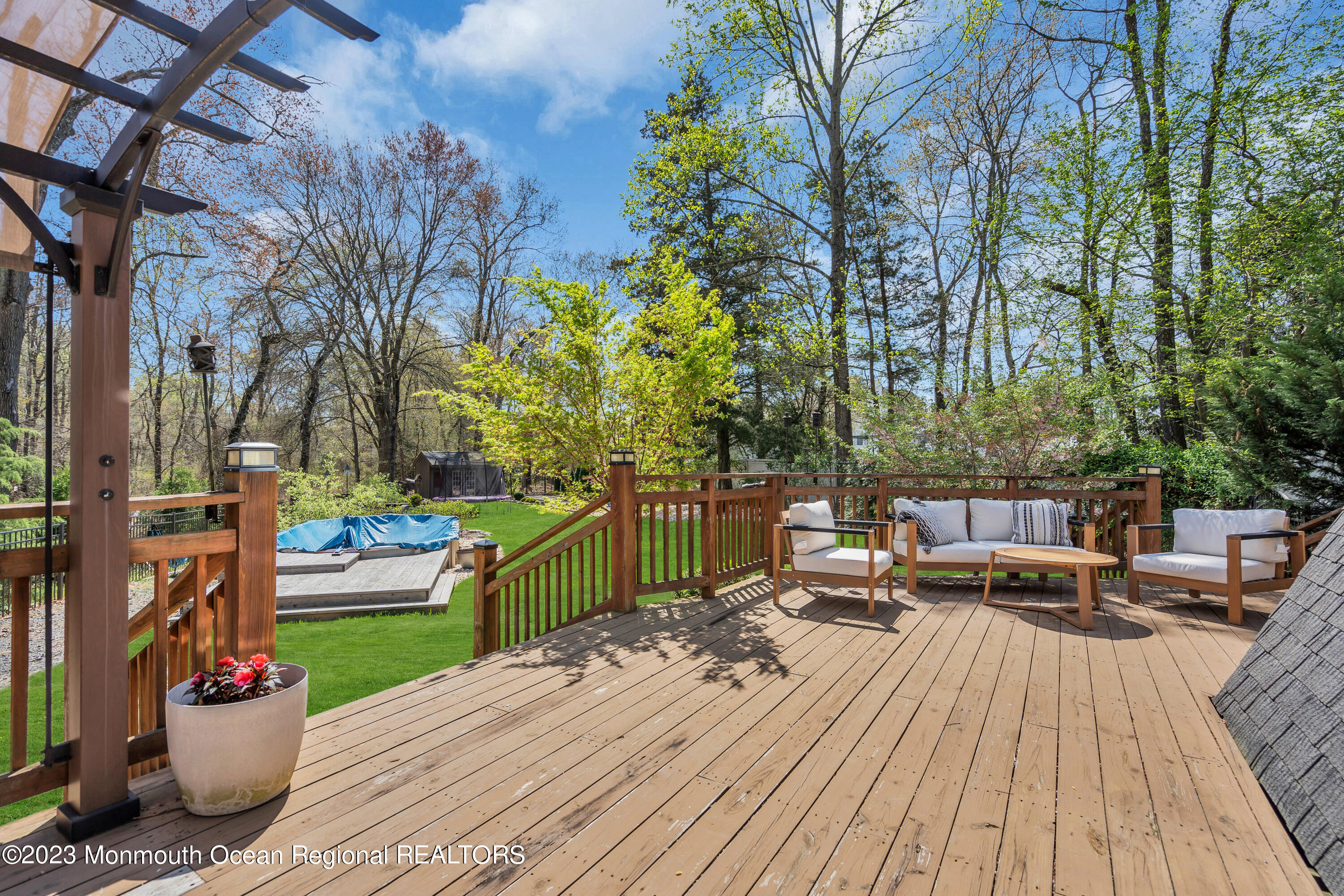 649 Hyson Road Jackson, NJ 08527 - Photo 58 of 67 a view of a backyard with sitting area