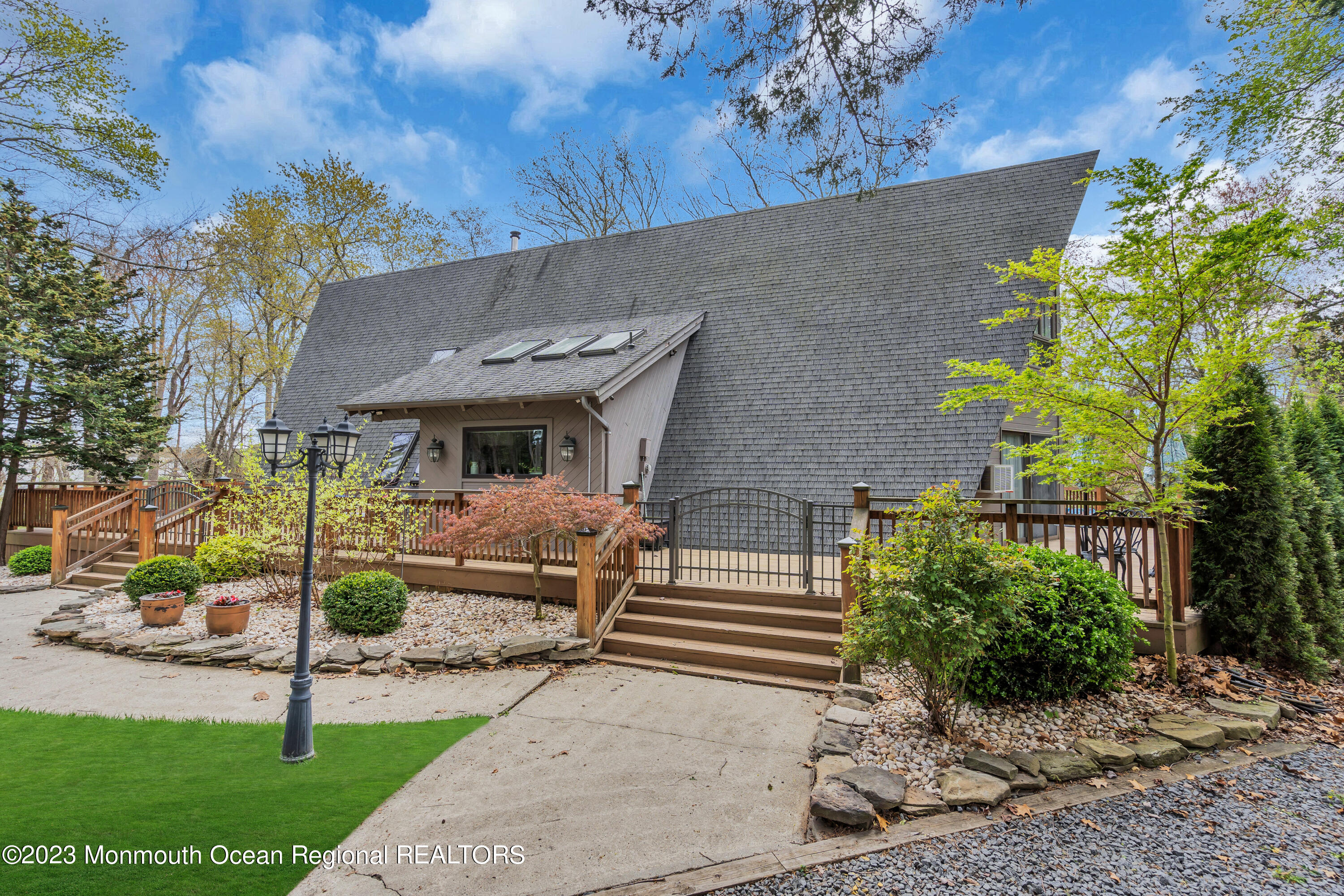 649 Hyson Road Jackson, NJ 08527 - Photo 8 of 67 a front view of a house with garden