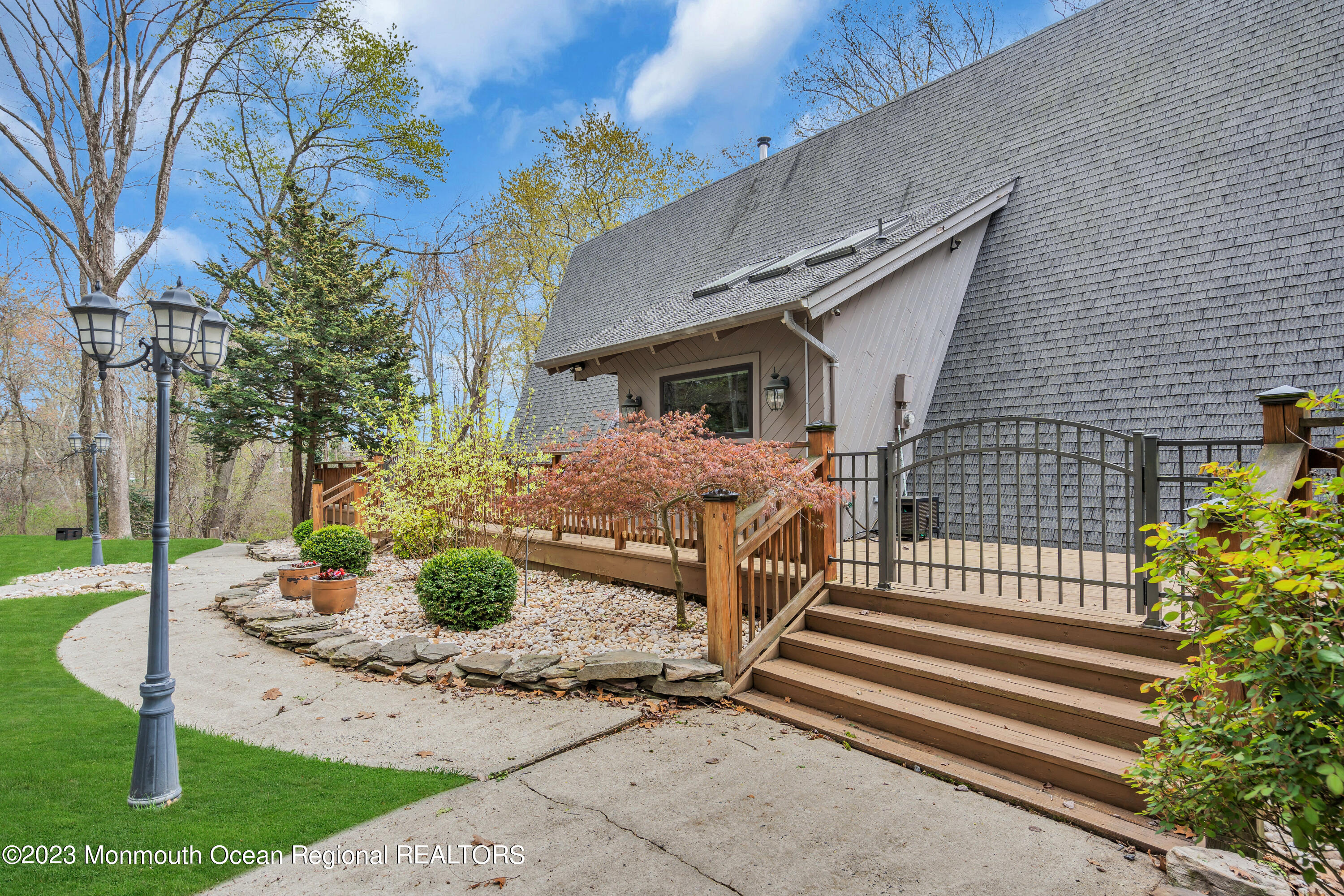 649 Hyson Road Jackson, NJ 08527 - Photo 10 of 67 a front view of a house with garden