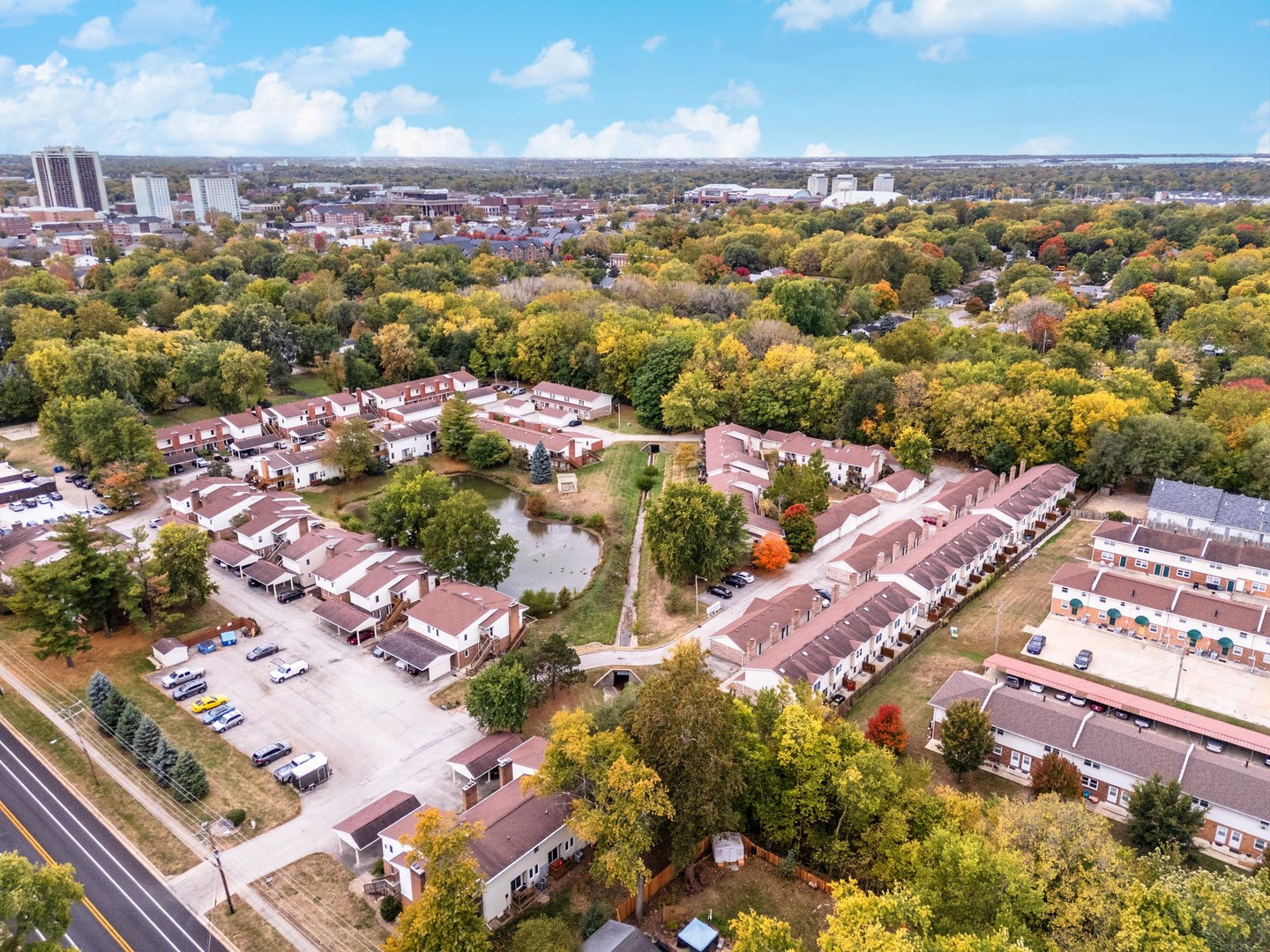 105 East Lincoln Street, Unit K Normal, IL 61761 - Photo 7 of 35 an aerial view of residential houses with outdoor space