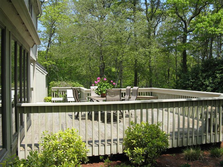 241 Fells Pond Road Mashpee, MA 02649 - Photo 15 of 16 a view of a lake with a deck