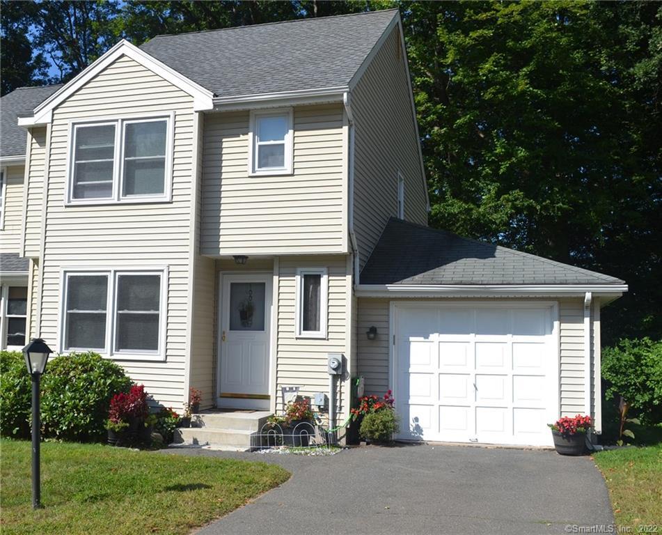 100 Allen Street, Unit 100 Windsor, CT 06095 - Photo 1 of 1 a front view of a house with garden
