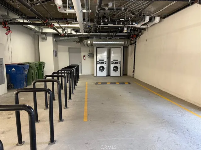 a view of an chairs and table in the room