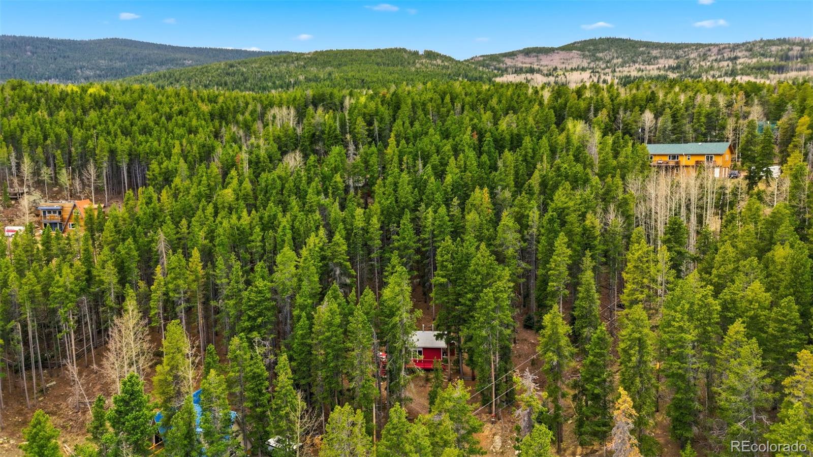 154 Apache Road Evergreen, CO 80439 - Photo 24 of 30 a view of lake and mountain