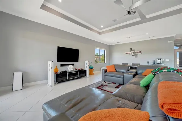 a kitchen with stainless steel appliances a stove a sink a microwave a refrigerator and cabinets