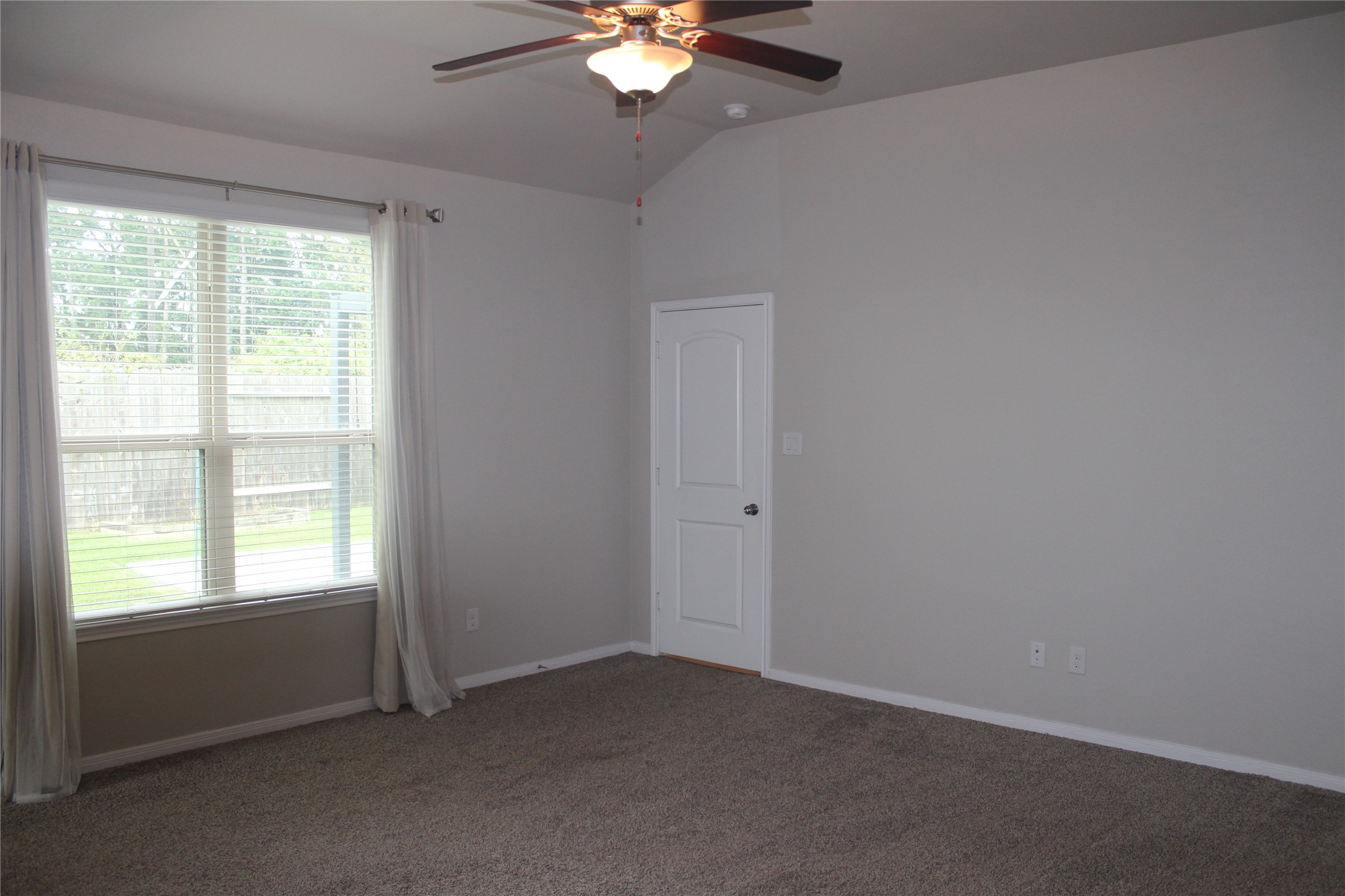 14200 Wallowa Ridge Lane Conroe, TX 77384 - Photo 11 of 22 a view of an empty room with a window