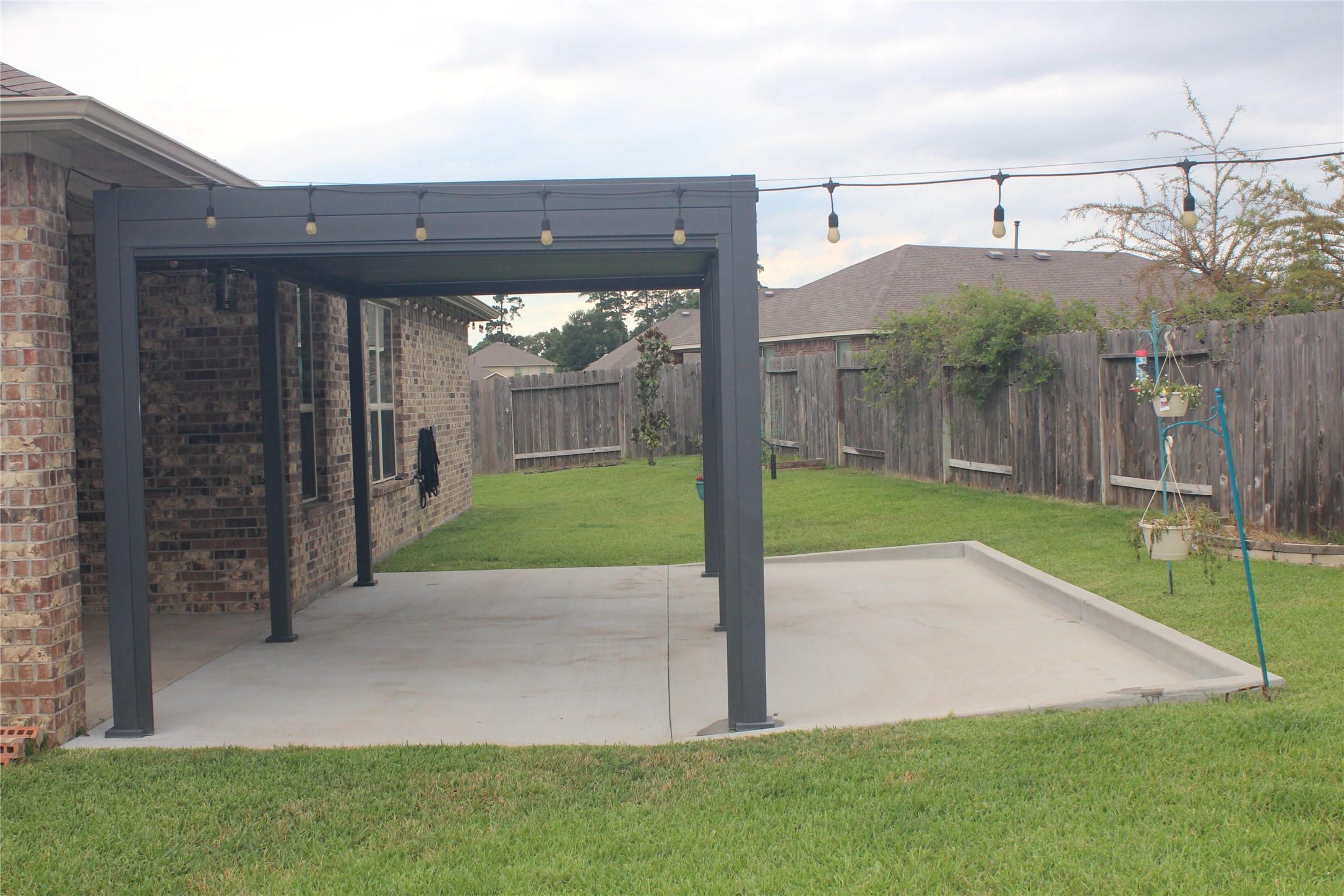 14200 Wallowa Ridge Lane Conroe, TX 77384 - Photo 16 of 22 a view of a back yard