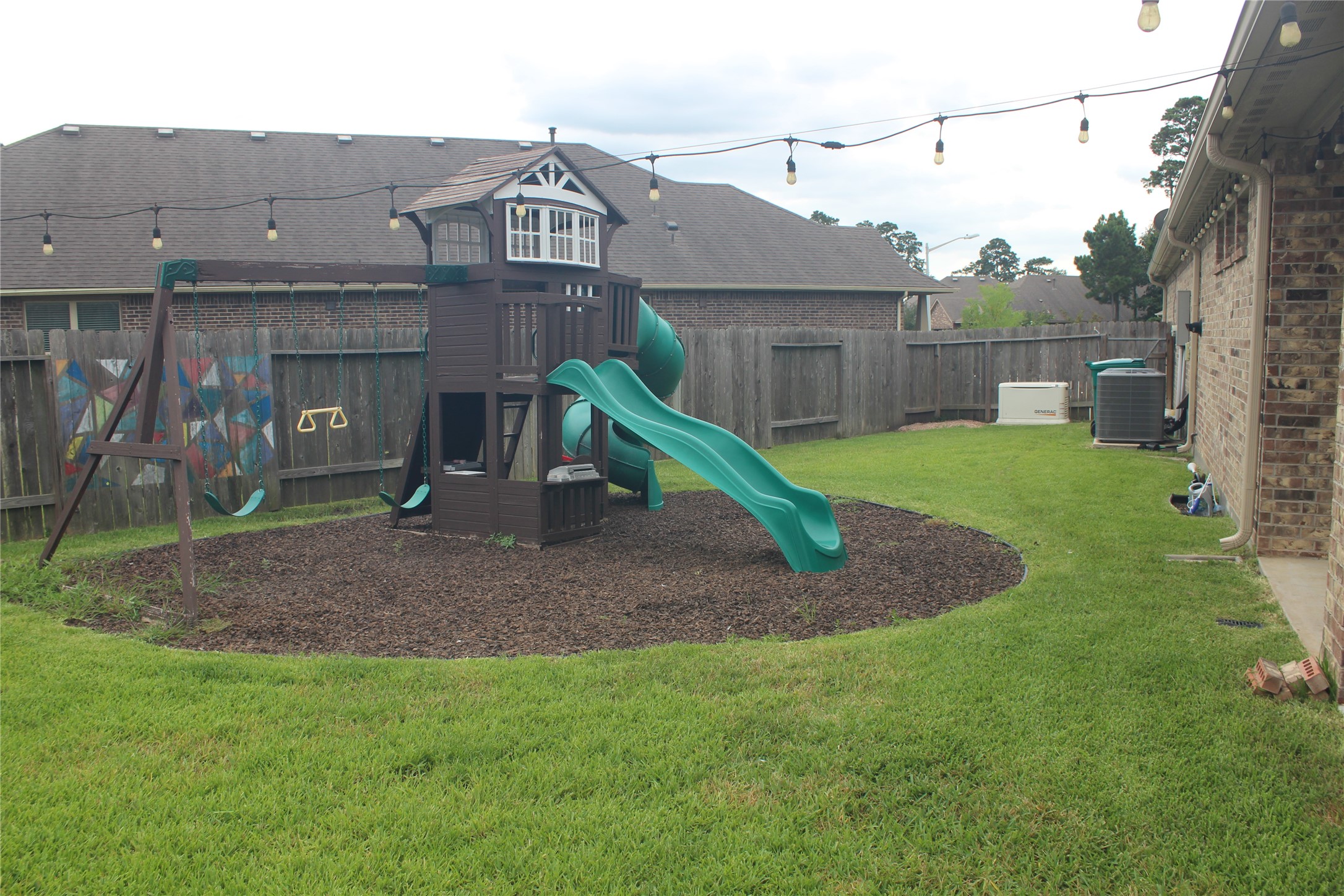 14200 Wallowa Ridge Lane Conroe, TX 77384 - Photo 17 of 22 a view of a house with a yard