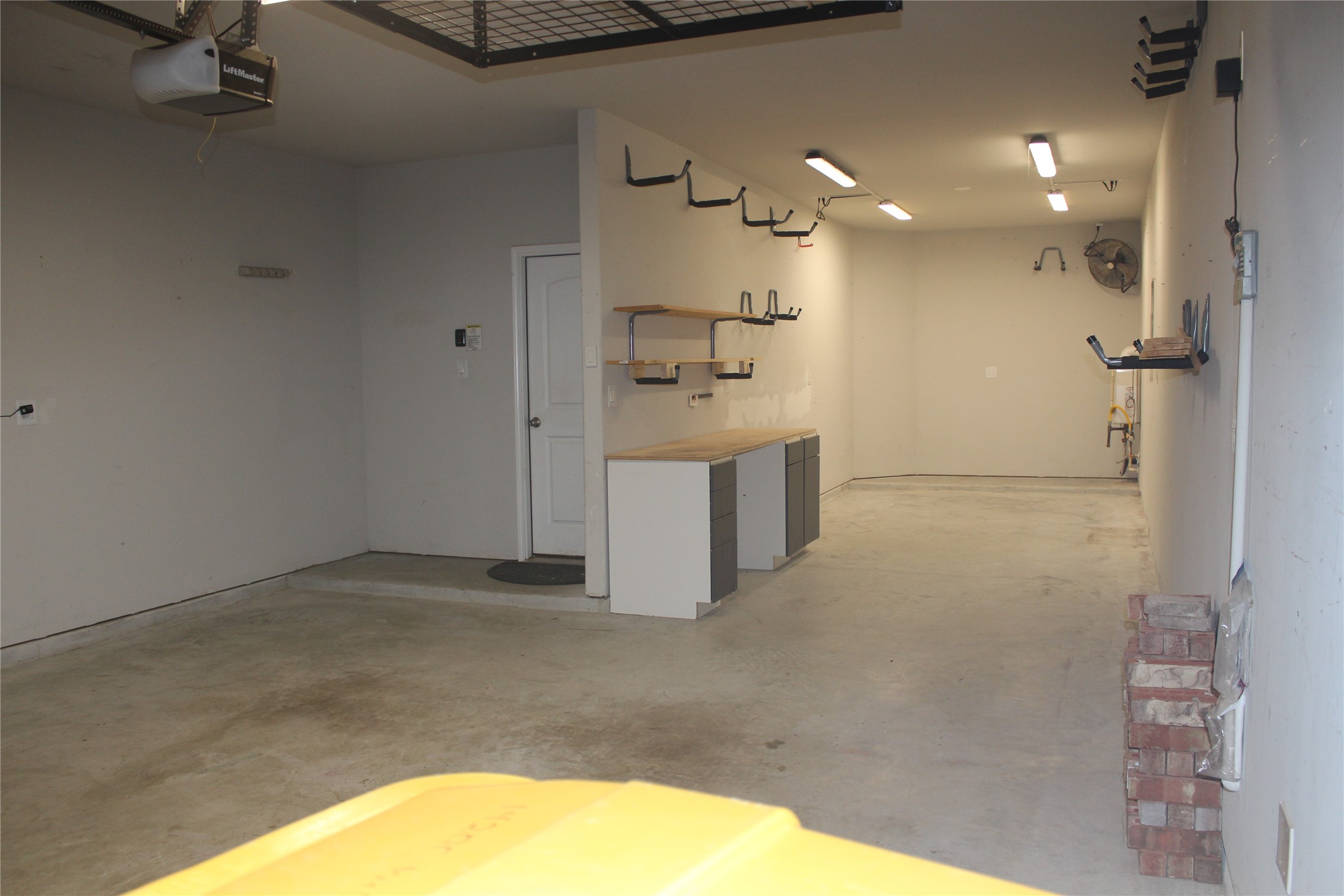 14200 Wallowa Ridge Lane Conroe, TX 77384 - Photo 18 of 22 a view of a hallway with a kitchen