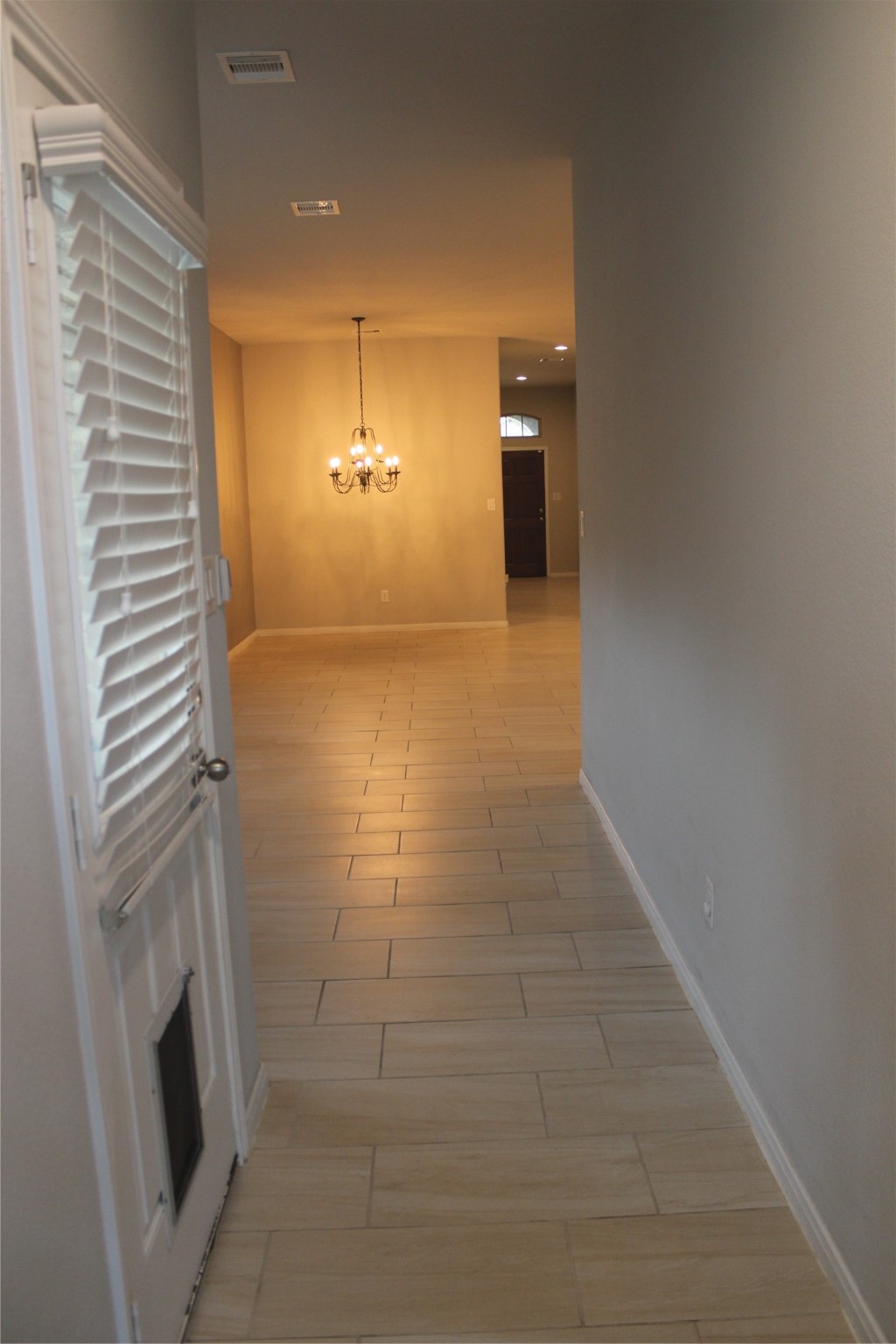 14200 Wallowa Ridge Lane Conroe, TX 77384 - Photo 9 of 22 a view of a hallway with washer and dryer