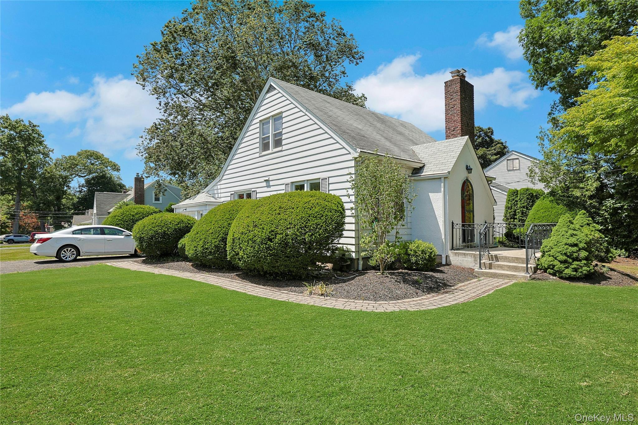 333 South Middletown Road Nanuet, NY 10954 - Photo 22 of 22 a view of a house with a yard and a garden