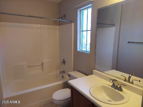 1505 East Chipman Road Phoenix, AZ 85040 - Photo 13 of 15 a bathroom with a sink toilet and shower