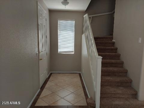 1505 East Chipman Road Phoenix, AZ 85040 - Photo 2 of 15 a view of entryway with stairs and a window