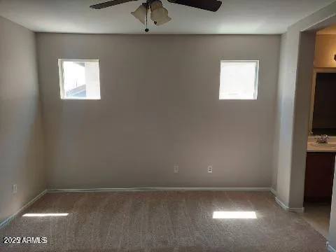 a view of an empty room and window