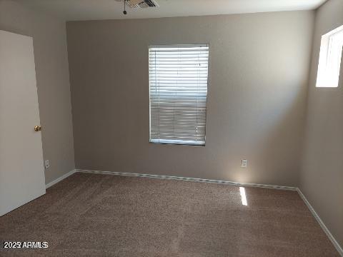 1505 East Chipman Road Phoenix, AZ 85040 - Photo 8 of 15 an empty room with a window