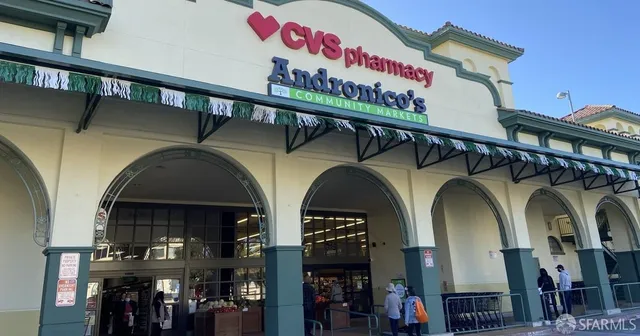 a view of a chairs and a table in the patio