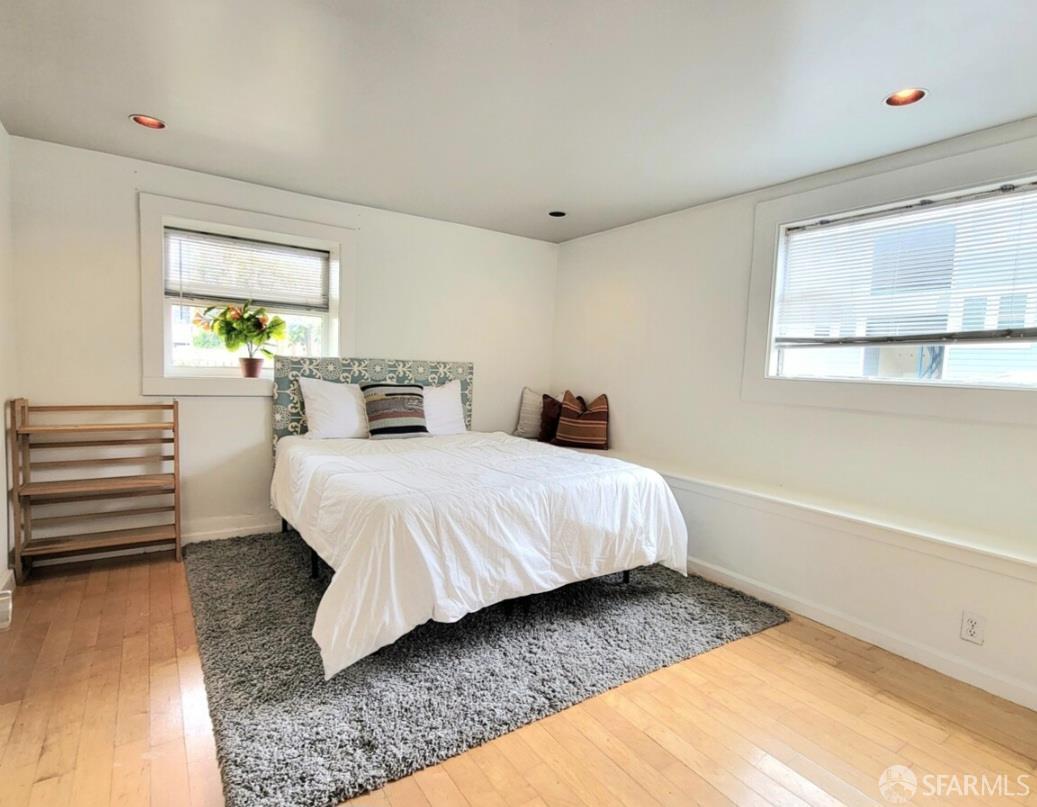 365 22nd Avenue San Francisco, CA 94121 - Photo 6 of 22 a bedroom with a bed and a window
