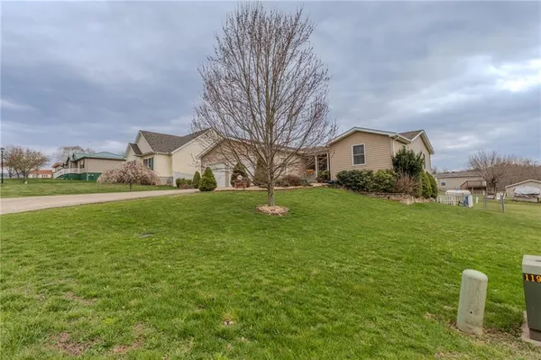 a house view with a garden space