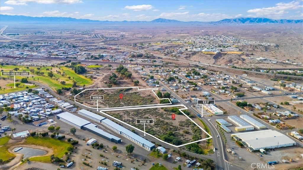 429 North K Street Needles, CA 92363 - Photo 25 of 39 an aerial view of residential houses with outdoor space