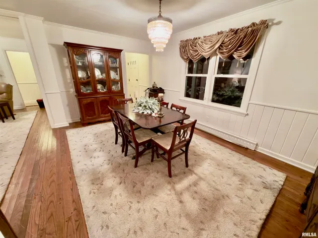 a view of entryway with wooden door