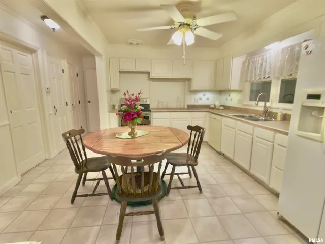 a view of a yard with trees in the background