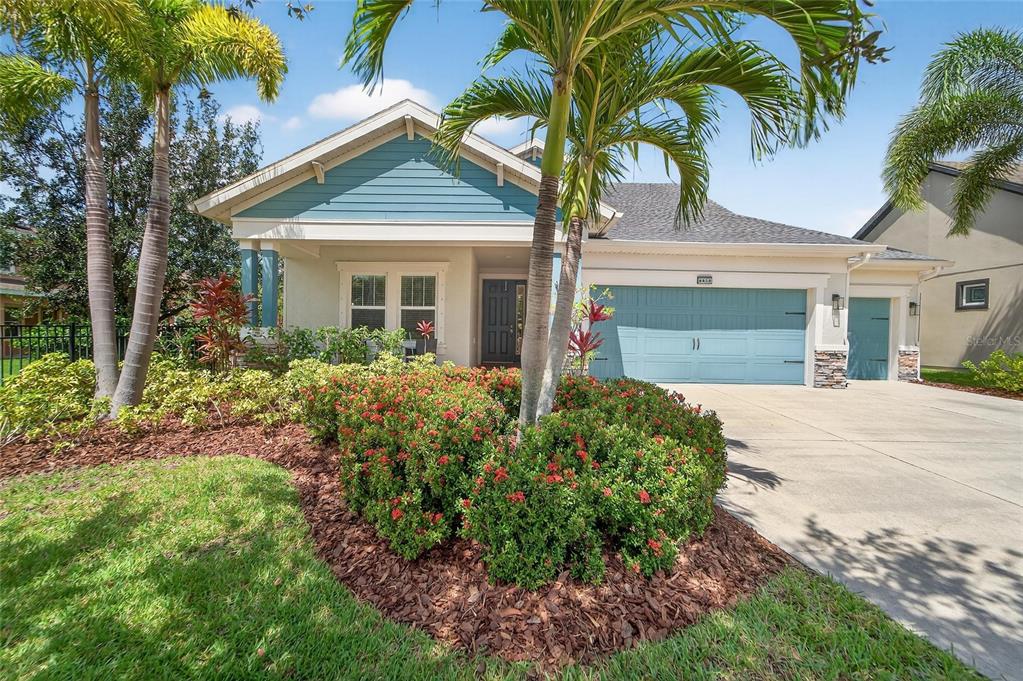 front view of a house with a yard