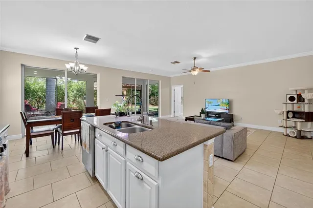 a view of a room with wooden floor and window